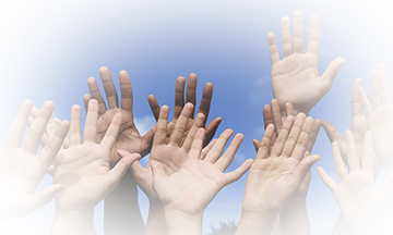 volunteering with hands in the air